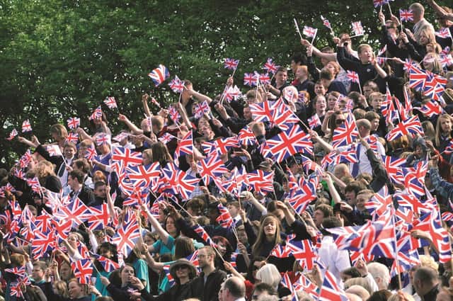 A sea of red, white and blue flags greeted the Queen when she opened the newly restored Open Air Theatre in 2010.