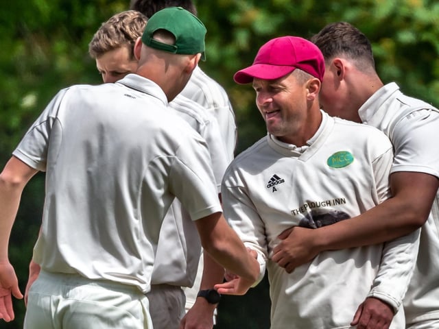 Mulgrave CC celebrate taking the wicket of Cayton opener Toby Jones with a run-out by Andy Raw