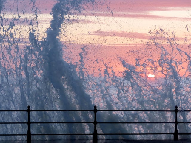 Sunrise with wave