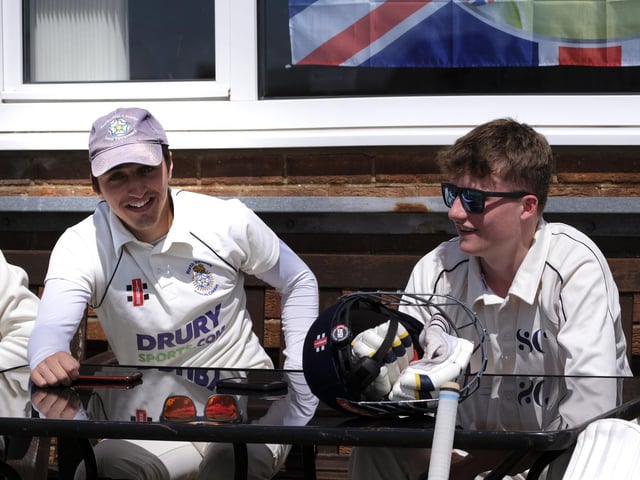 Ganton players share a joke during their team's innings