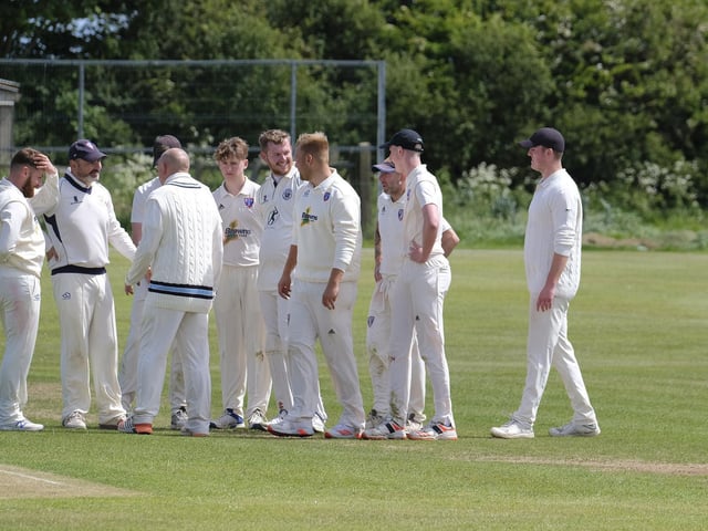 Cayton Cricket Club 2nds celebrate taking a Ganton Cricket Club wicket