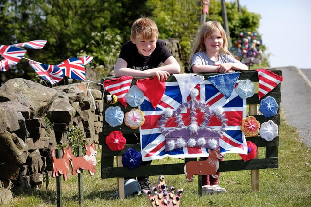 Kenny and Niamh Barron with some of the Jubilee decorations in Staintondale. Photo: Richard Ponter