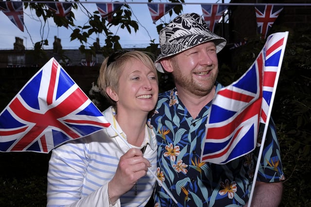 Sarah and Dave Watson fly the flags at the opening of Filey's Jubilee celebrations. Photo: Richard Ponter