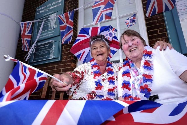 June Paylor and Margaret Peart enjoy the music at Whitby's celebrations at Pannett Park. Photo: Richard Ponter
