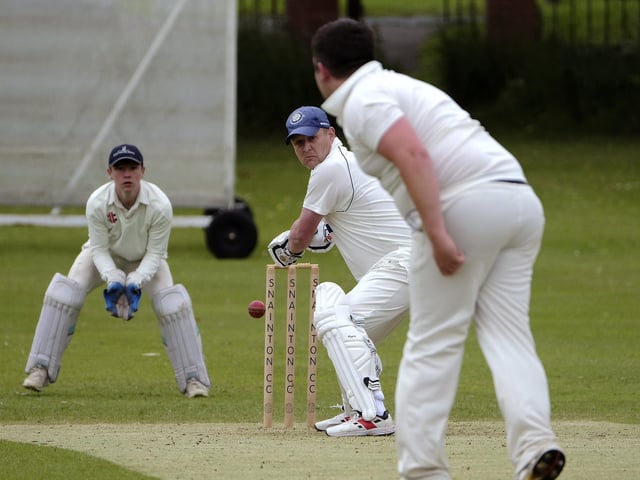 Ben Corner bowls to Rich Cook