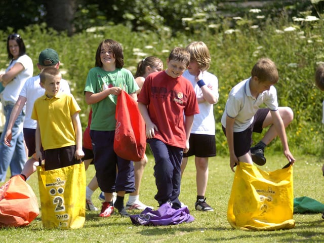 Children get ready for the sack race at Airy Hill Primary School's sports day.