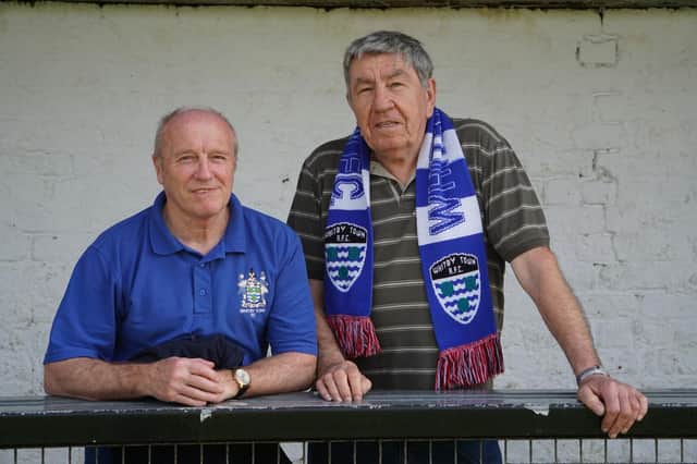 Whitby Town volunteer Rob Rowell, right