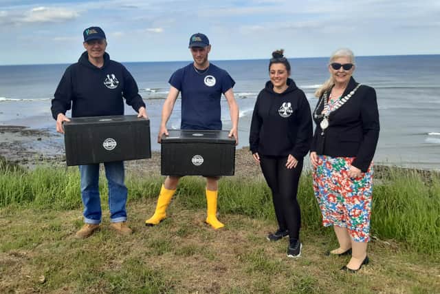 Whitby fisherman James Cole, Whitby Lobster Hatchery General Manager Joe Redfern, Natasha Roe-Smith, managing partner at fishmonger Cod Roe and Whitby Town Mayor, Cllr Linda Wild.