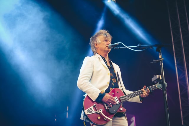 Neil Finn stood out in his white suit