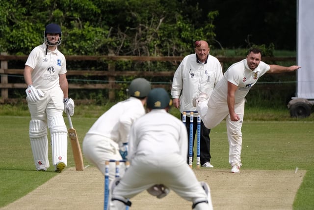 Flixton 2nds bowler Chris Mann bowls to Scalby's Joe Davies, who smacked a superb 140