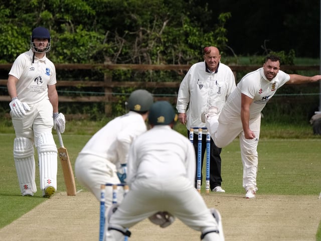 Flixton 2nds bowler Chris Mann bowls to Scalby's Joe Davies, who smacked a superb 140
