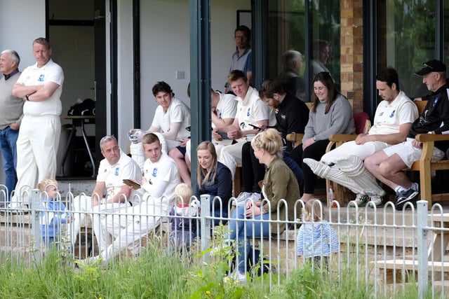 Scalby Cricket Club players and fans watch the game