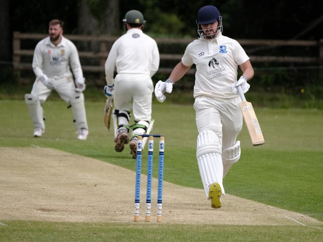 Brett Cunningham, nearest camera, and Joe Davies scamper through for a run