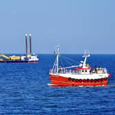 This great photograph, taken by Aled Jones, shows two vessels in Bridlington Bay on a beautiful day.