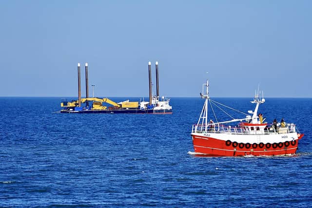 This great photograph, taken by Aled Jones, shows two vessels in Bridlington Bay on a beautiful day.