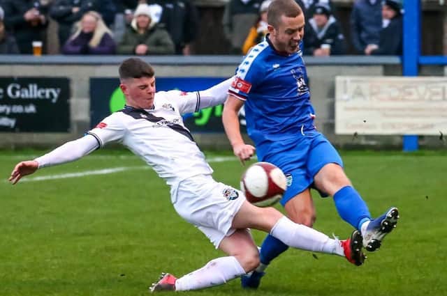 Jake Hackett has signed a new one year deal with Whitby Town
