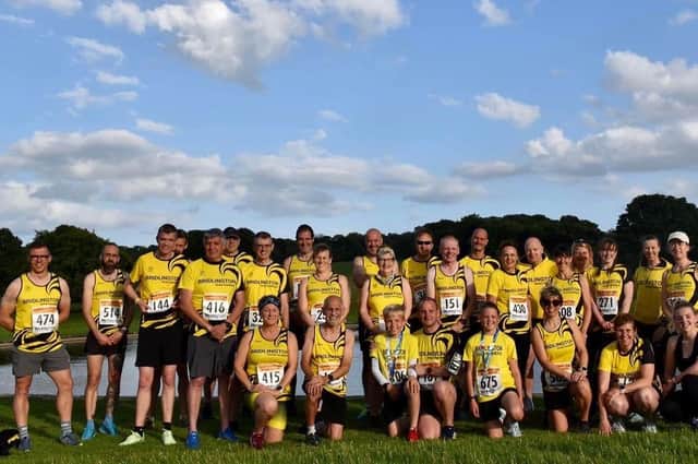 The Bridlington Road Runners team line up at the Sledmere Sunset Trail race
Photo by TCF Photography