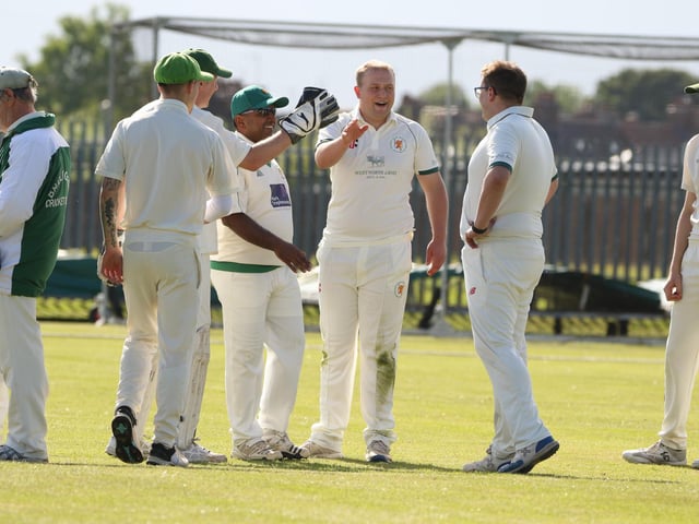 Malton & Old Malton 3rds celebrate taking a Bridlington CC 3rds wicket