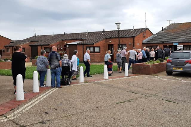 People queuing to vote in the Whitby parish poll at Marton Court Community Centre.