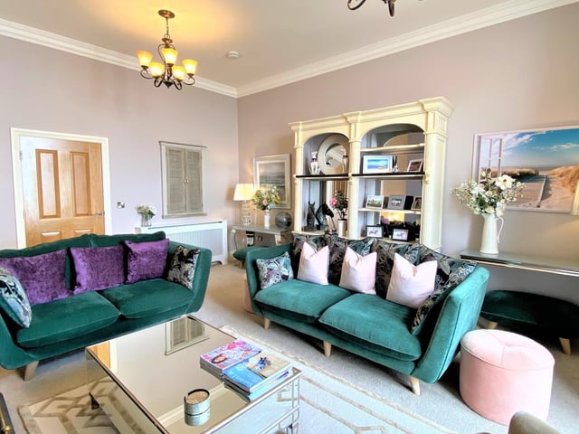 The impressive interior includes this comfortable lounge.