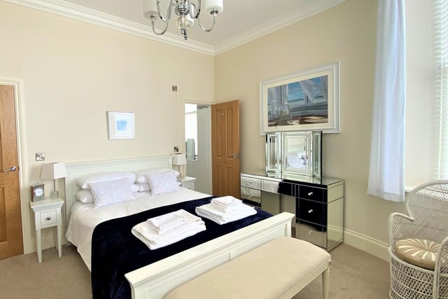 One of the light and spacious double bedrooms within the apartment.