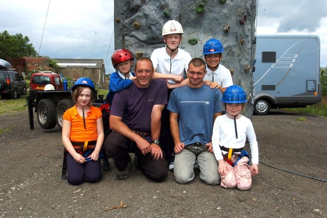 Castleton Primary School pupils reach for the top with a day at the climbing wall. Children are pictured with instructor Mat Etheridge.