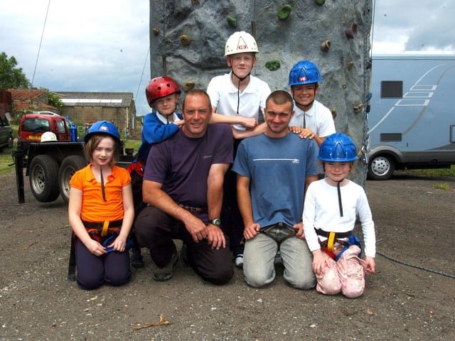 Castleton Primary School pupils reach for the top with a day at the climbing wall. Children are pictured with instructor Mat Etheridge.