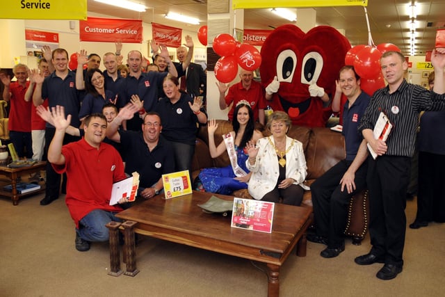 Mayor Hazel Lynskey with Miss Scarborough Alice Czyz, pictured with the store's staff and volunteers, open the British Heart Foundation store on Aberdeen Walk.