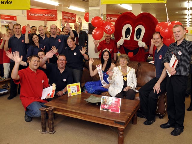 Mayor Hazel Lynskey with Miss Scarborough Alice Czyz, pictured with the store's staff and volunteers, open the British Heart Foundation store on Aberdeen Walk.