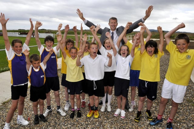 Former Olympic athlete Steve Cram, back, with youngsters from the four schools taking part in the indoor athletics competition at Scarborough Rugby Club, Northstead, Friarage, Newby and Gladstone Road.