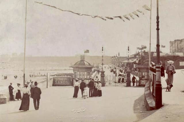 This postcard from around 1904 shows the gated area where a stroll along the south seafront cost 6d. Postcard courtesy of Aled Jones