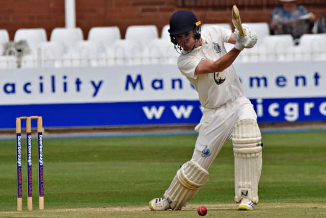 Scarborough CC 2nds opener Brad Milburn smacks a superb cover drive