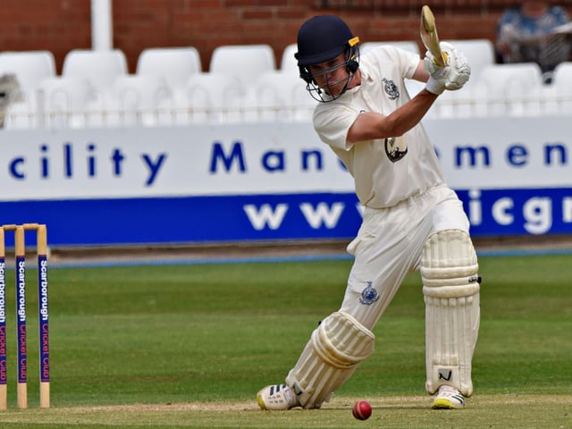 Brad Milburn hits a cover drive