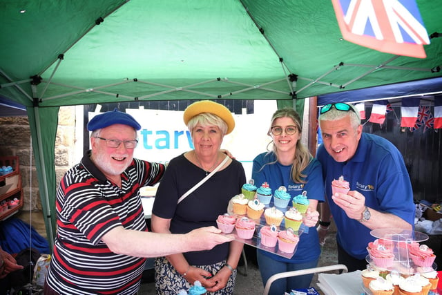 Scarborough Rotary cake stall with Ian Holland, Judith Goode, Eleanor Wood and dad Nigel Wood.
