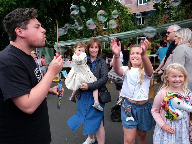 Jack Boddy creates bubbles galore at the fair.