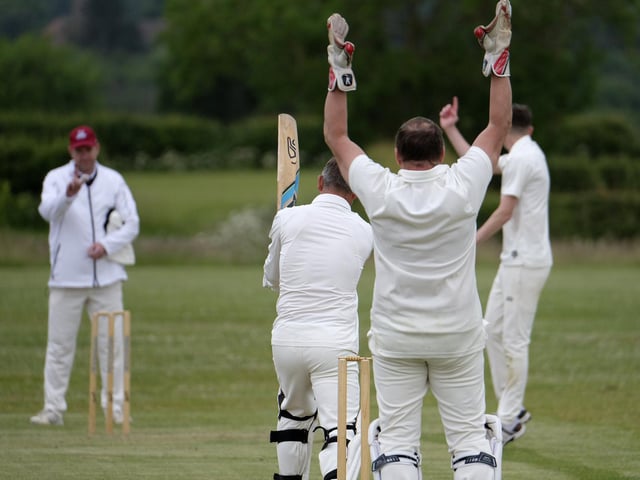 Jack Carradice-Clarkson of Flamborough snares Scarborough Rugby Club batter Paul Bond leg-before