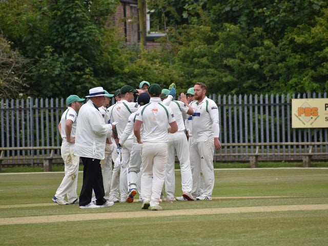 Bridlington CC celebrate taking a Folkton & Flixton CC wicket