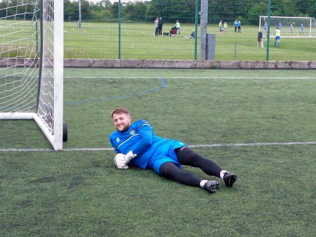 Whitby keeper Shane Bland takes a break