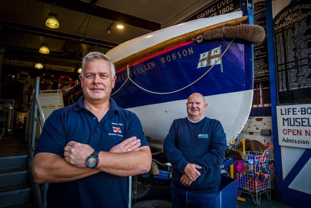 Whitby lifeboat museum curator Neil Williamson with shop manager Barrie Lazenby outside the museum where Robert & Ellen Robson is housed.