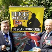 Cllr Eric Broadbent, Mayor of the Borough of Scarborough (left) and John Senior MBE TD (right) with the commemorative coins