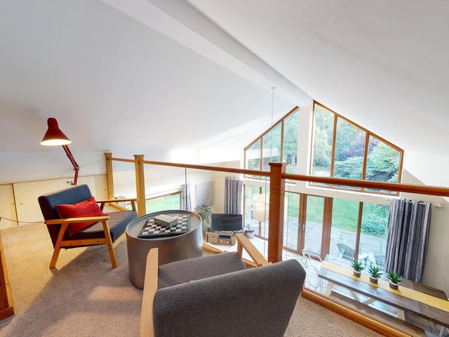Seating on the mezzanine that formed part of the extension within the property.