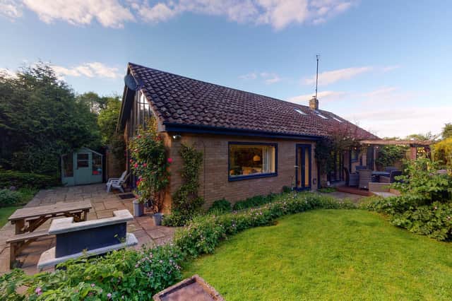 A traditional bungalow extended to become a large, open plan modern home.