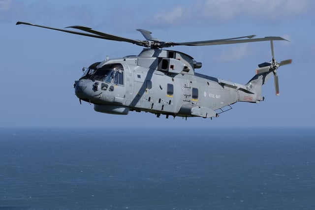 A parade salute accompanies by a flypast of a Royal Navy Merlin and Wildcat Helicopter and the Navy Wings charity's Supermarine Seafire will take place at 11.25am above the South Bay.