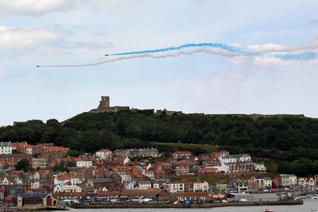 Red white and blue trails were left in the sky by the iconic planes