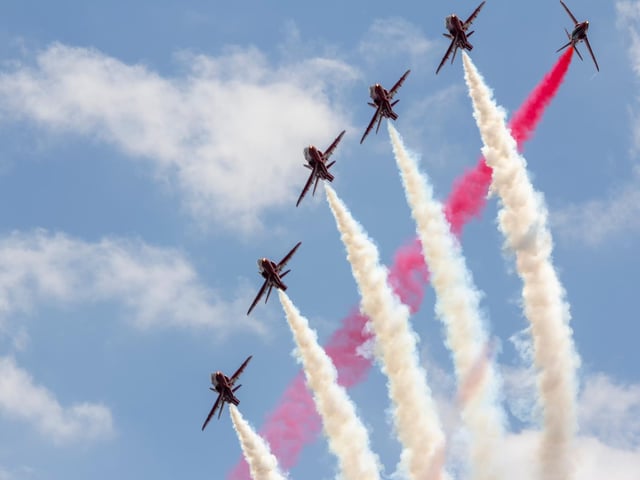 The Red Arrows perform a daring manoeuvre