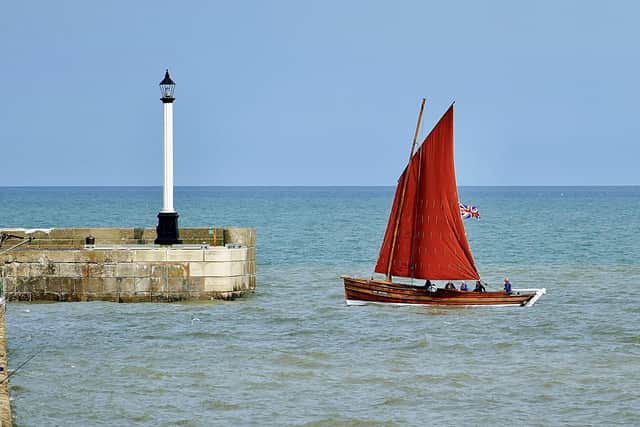 This image, by Aled Jones, focuses on the Three Brothers coble just outside Bridlington harbour.