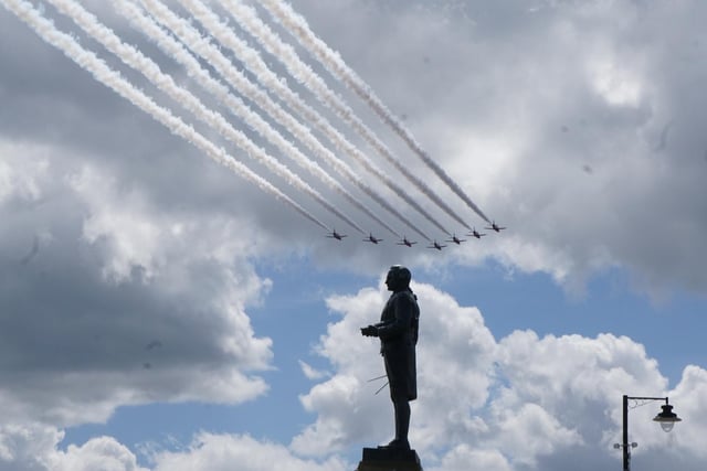 Captain Cook greets the Red Arrows.