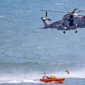 Several RNLI members were winched to the Royal Navy helicopter. Photo taken by Rod Newton