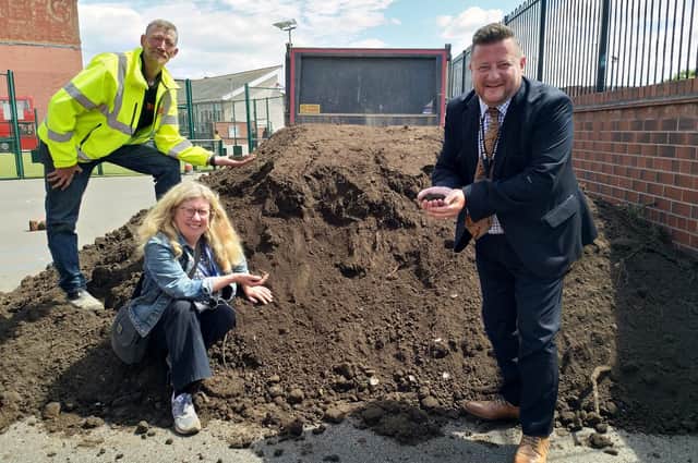soil delivery to the school
Pictured: Adam Blakestone - PBS Construction (back left), Jane Pepper - Gladstone Road Primary School chair of governors (front left), Garry Johnson - Gladstone Road Primary School headteacher (front right).