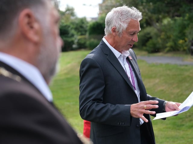 Cllr Rich Maw gives a speech while Mayor Eric Broadbent looks on
